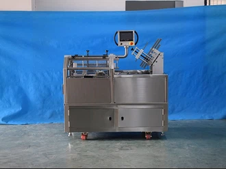 Automatisk kartonmaskine